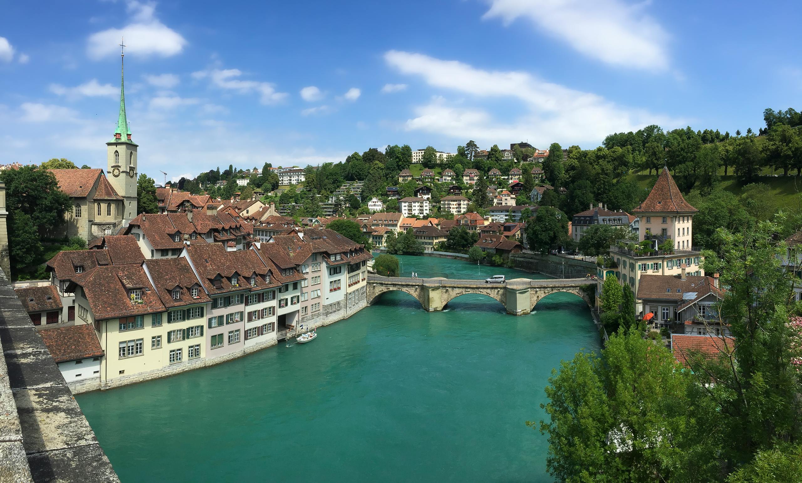 Beautiful aerial view capturing Bern's scenic old town and river in summer.